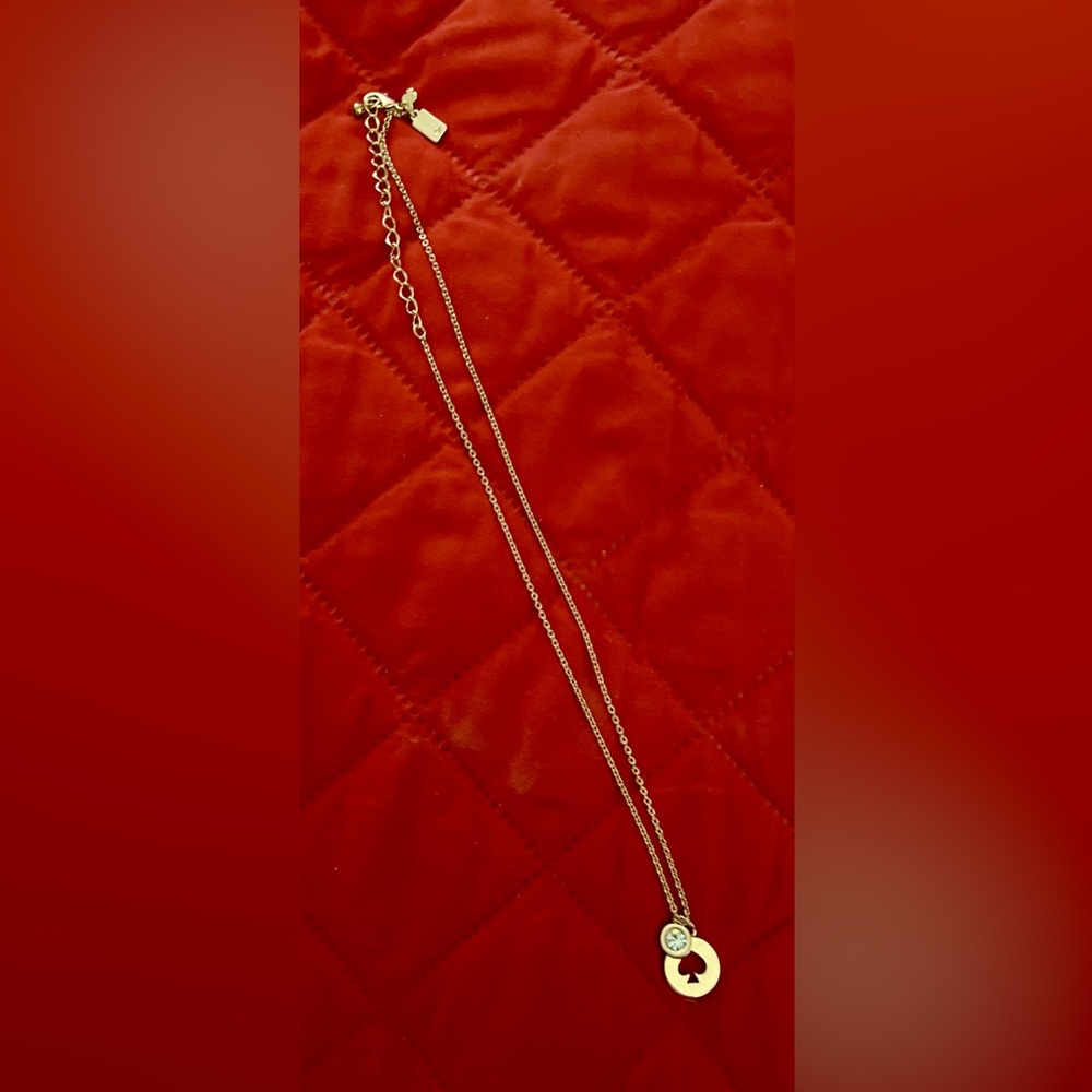 Kate Spade Rose Gold Adj. Delicate Chain Necklace Spade Insignia With CZ Accent.